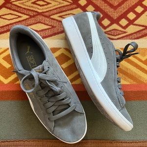 Grey puma gold and white swoosh
